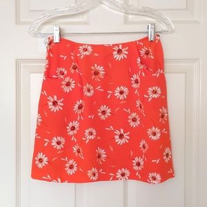 NWOT. Vintage Express 100% Rayon Orange Mini Skirt w/white chrysanthemum flowers